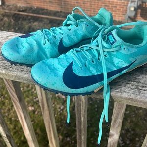 Nike running shoes used 1/2 season. Very clean showing no wear.